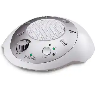 Homedics SoundSleep white noise machine in silver with volume knob, timer controls, and buttons for nature sounds like ocean, rain, and thunder for relaxation and sleep